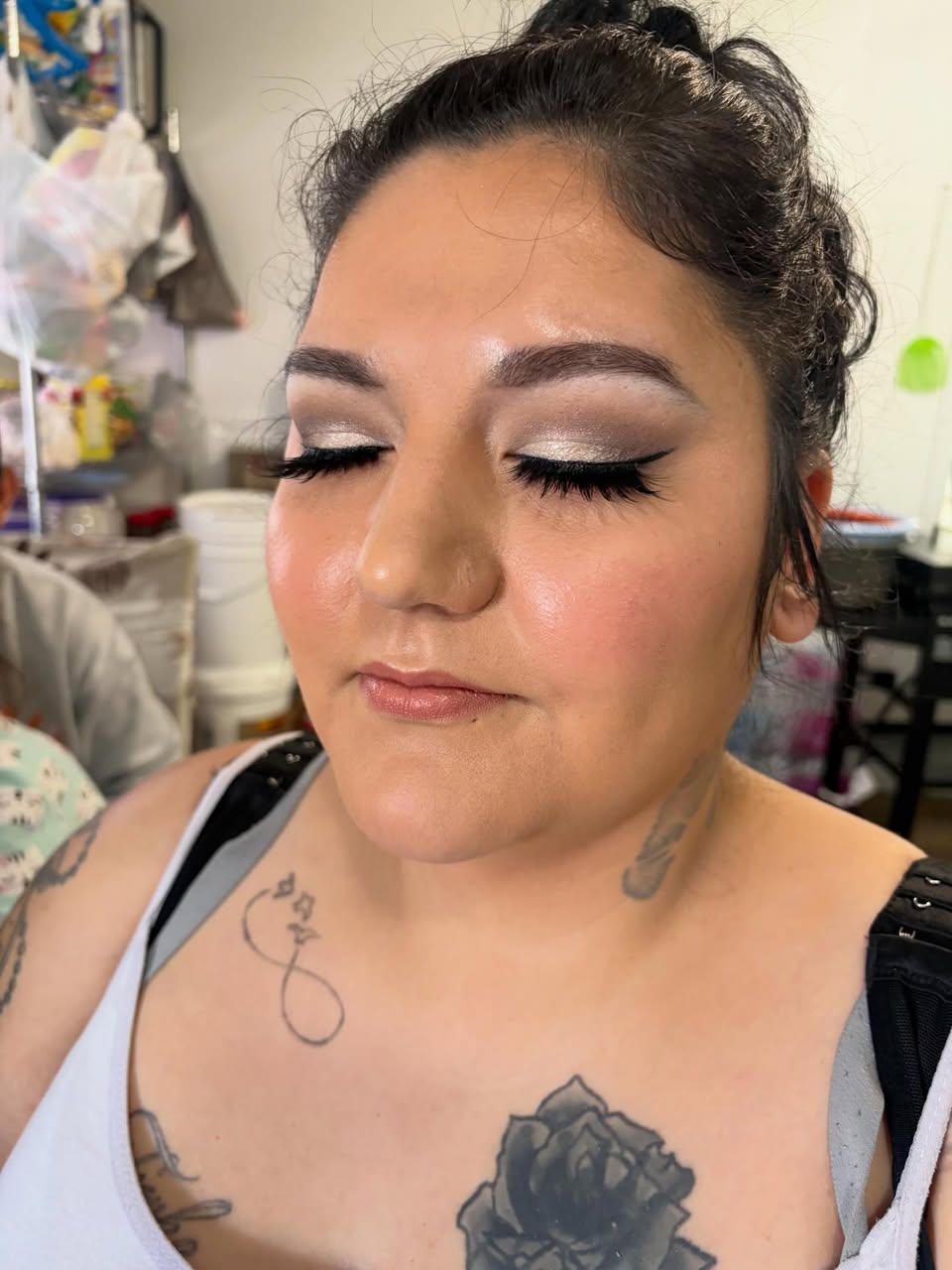 Bridal client with silver smokey eye, full lashes, and dewy skin by MakeupByGen